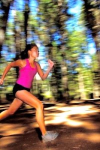 7755961-runner-female-running-fast-in-forest-motion-blurred-image-of-beautiful-asian--caucasian-woman-athlet
