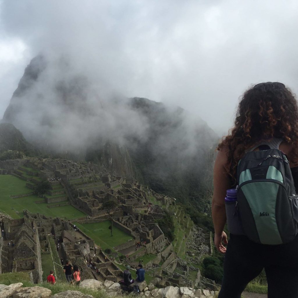 Backpacker overlooking Machu Picchu